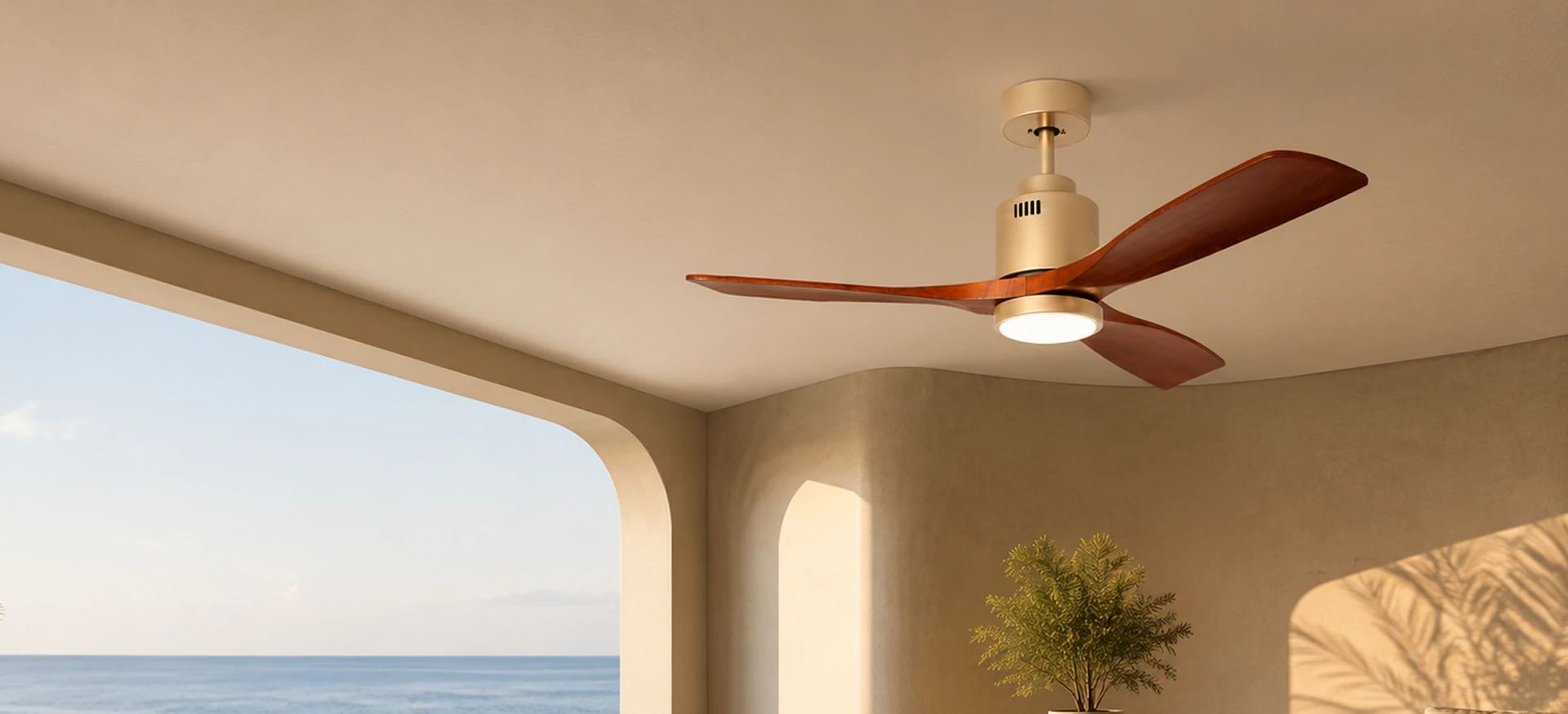 Modern ceiling fan with light and wood blades installed in a contemporary coastal living space