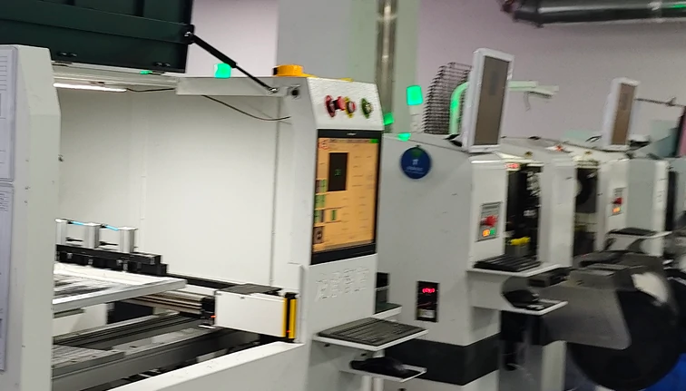 oem ceiling fan factory manufacturing production line showing automated machinery and assembly process for modern ceiling fan light systems in industrial workshop