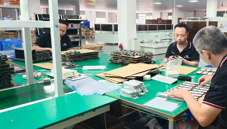 quality control inspection process for ceiling fan manufacturing showing engineers testing motor performance and product quality before shipment in factory