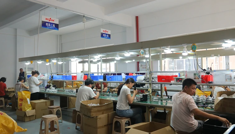 42 Inch Ceiling Fan LED production process showing organized assembly workflow for retractable fan light manufacturing