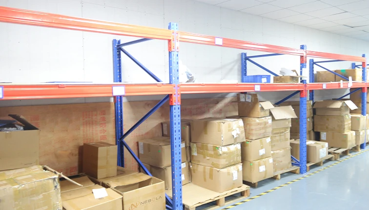 warehouse storage of packed ceiling fan cartons prepared for international export shipping showing OEM bulk order fulfillment capability