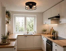 14 inch black cage hugger ceiling fan with E27 lights installed in a compact modern kitchen with low ceiling