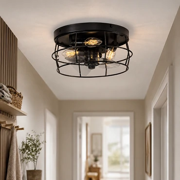 Side view of 14 inch black cage hugger ceiling fan highlighting low profile flush mount installation