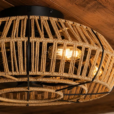 Close-up woven texture detail of a 20 inch farmhouse rattan caged ceiling fan with warm E27 lighting