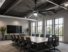 70 inch industrial large ceiling fan with integrated LED light illuminating a commercial workspace