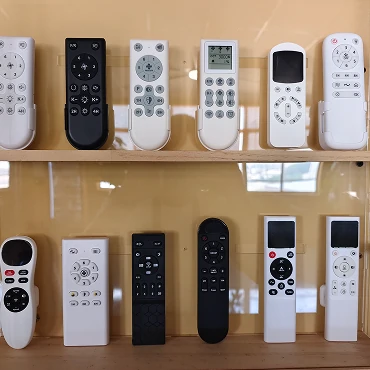 Remote control operation for industrial caged ceiling fan with multiple speed settings and timer functions.