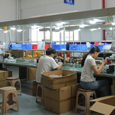 Assembly line quality check in ceiling fan manufacturing showing process control during product production stages