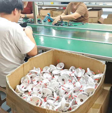 Factory incoming material inspection for ceiling fan production showing quality control of components before assembly
