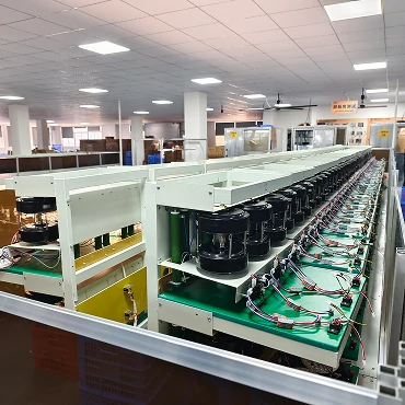 Motor performance testing line in ceiling fan manufacturing showing controlled quality inspection across production stages