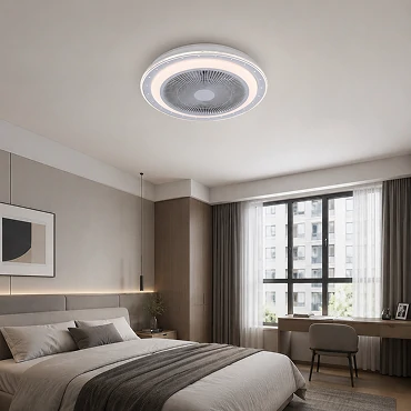 20 inch flush mount ceiling fan with LED light installed in a low ceiling apartment bedroom showing space saving design