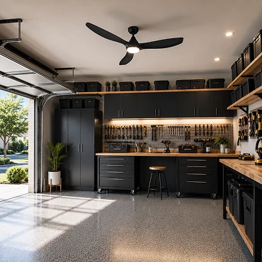 Garage ceiling fan with integrated LED lighting providing airflow and task illumination in a workshop