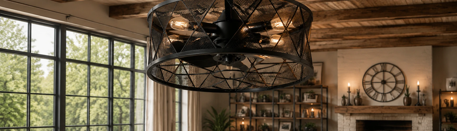 Close-up view of black industrial caged ceiling fan with light featuring metal mesh frame, Edison bulbs and six ABS fan blades.