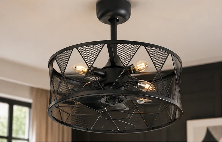 Industrial caged ceiling fan with light installed in a modern farmhouse interior with warm ambient lighting.
