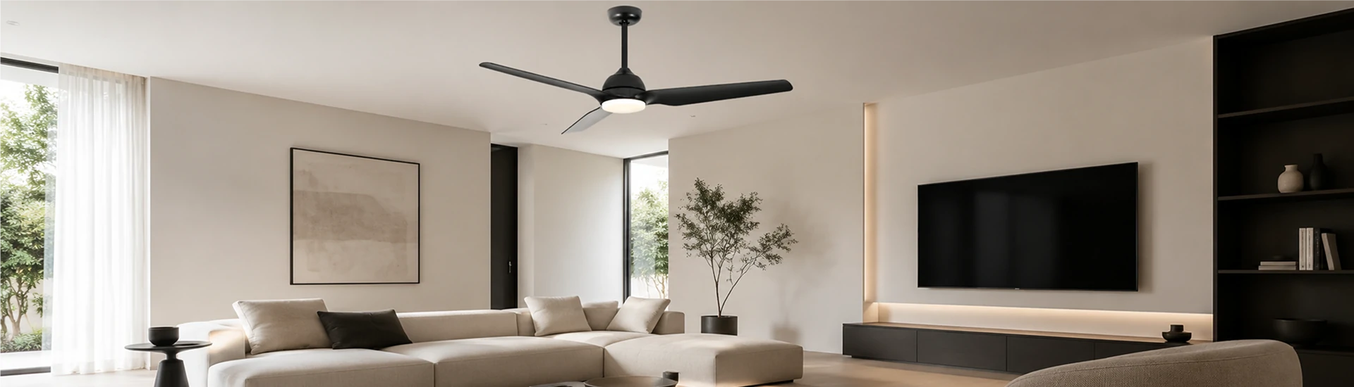 Modern black ceiling fan with light installed in a minimalist living room