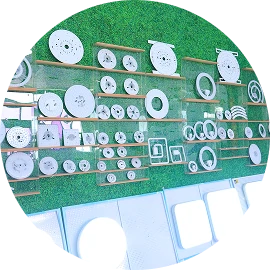 Indoor showroom displaying modern decorative fan lighting collections