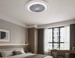 modern flush mount ceiling fan installed in low ceiling apartment bedroom designed for compact spaces hotels and residential interior projects
