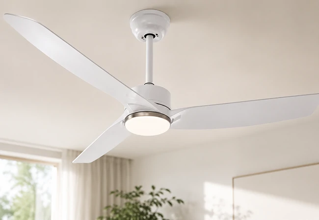 white ceiling fan with light installed in a modern room with flush mount ceiling design