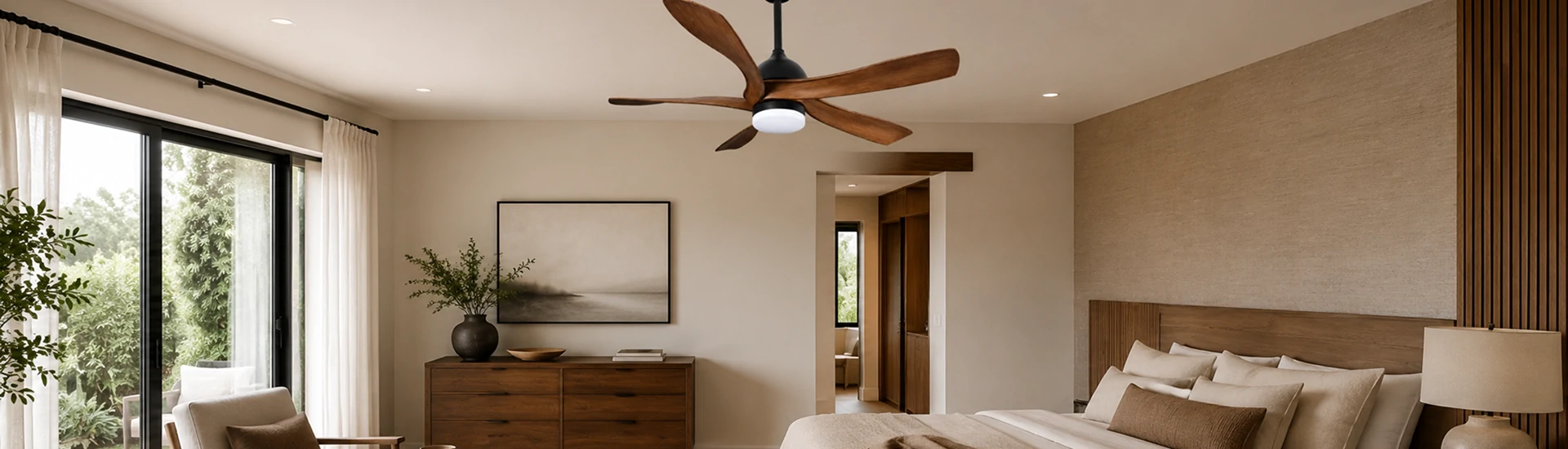 56-inch walnut drop ceiling fan with LED light installed in a modern bedroom interior for residential applications