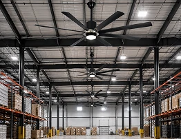 industrial caged ceiling fan light installed in modern loft warehouse interior designed for commercial ventilation and OEM wholesale supply projects