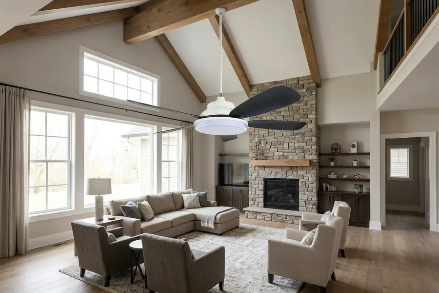 High ceiling room with downrod helping a large ceiling fan perform better