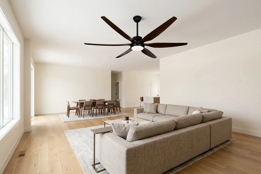 Large open plan living room with ceiling fan airflow zones