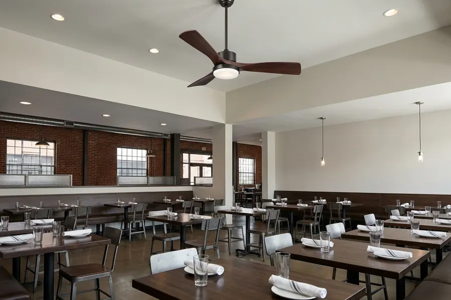 Restaurant ceiling height and downrod placement for commercial fan comfort