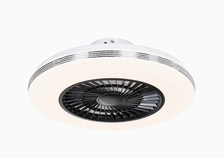 Wall-mounted fan installed along a modern apartment hallway corridor