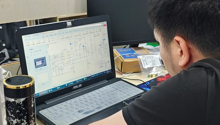 Technical team reviewing installation requirements for a bathroom ceiling light project