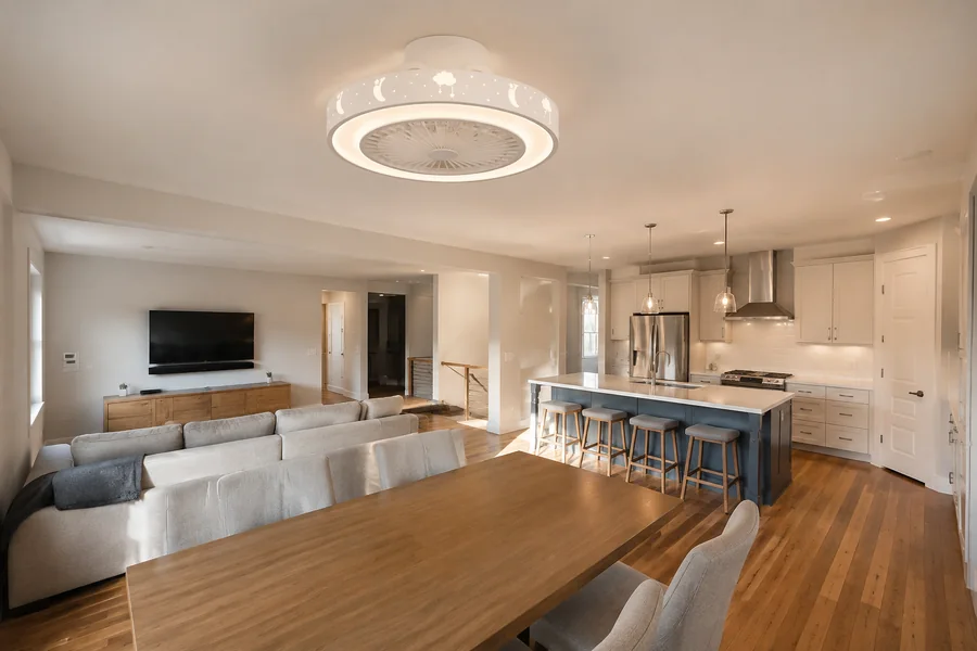 Should one large fan or several smaller fans serve an open concept room